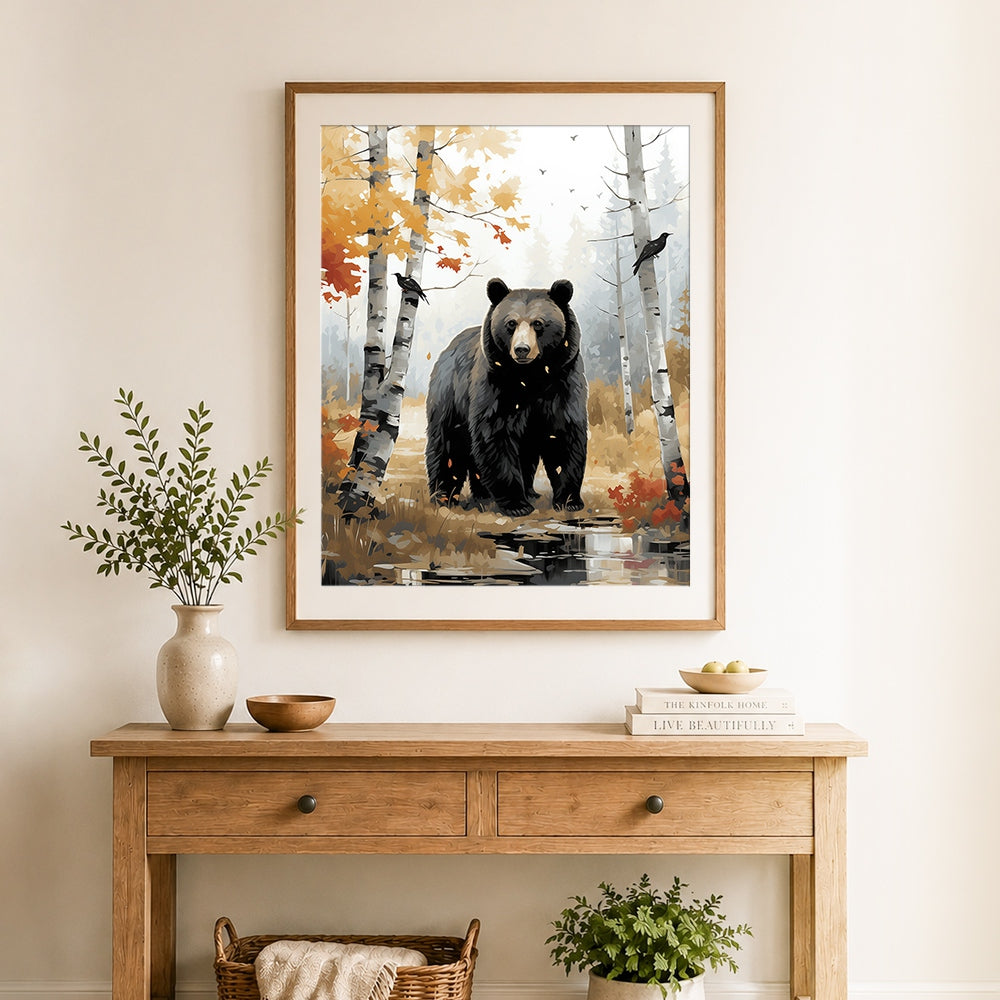 Finished black bear in autumn birch forest cross stitch artwork displayed as home decor