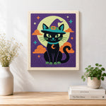Finished black cat beneath moon artwork displayed on a wall