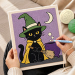 Creating handmade black cat by magic cauldron punch needle artwork