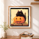 Finished black cat halloween pumpkin cross stitch artwork displayed as home decor