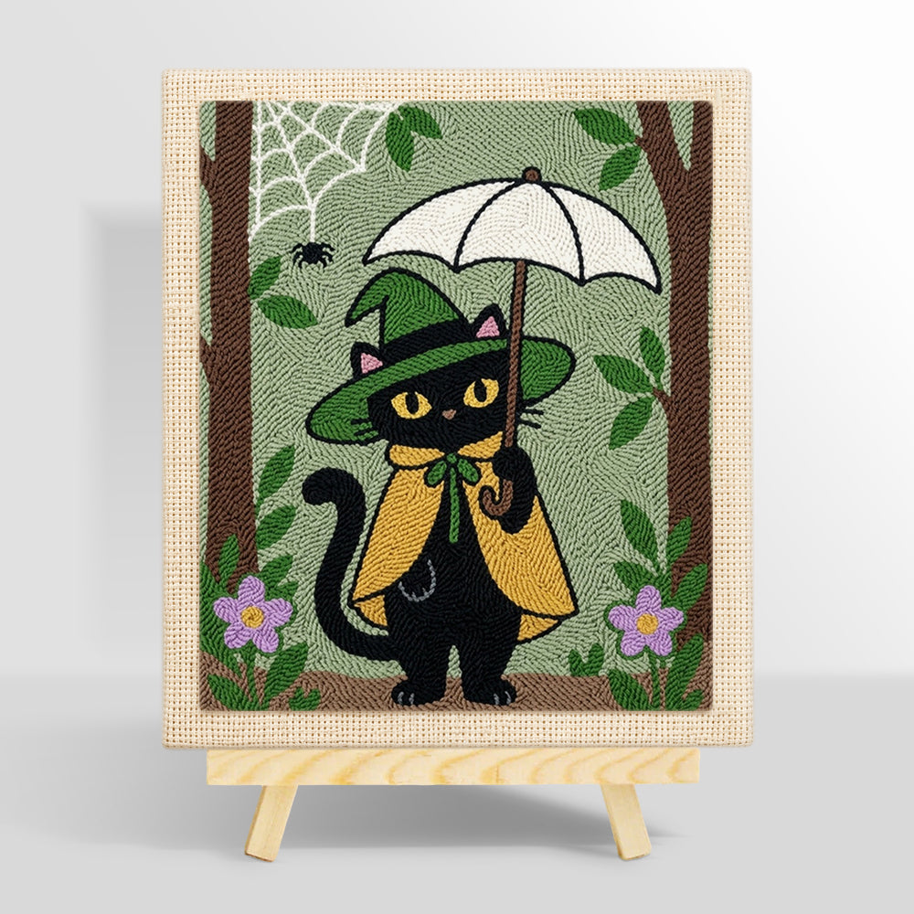 Black cat holding white umbrella punch needle kit for beginners