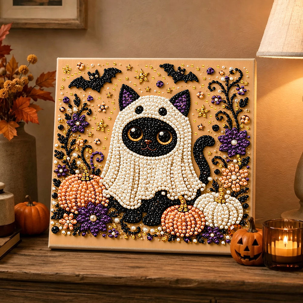 Finished black cat in ghost costume pearl diamond painting artwork displayed as holiday home decor