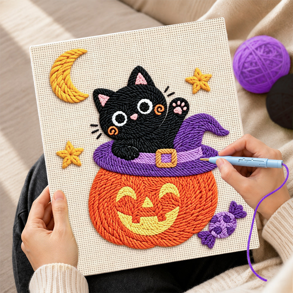 Creating handmade black cat inside pumpkin hat punch needle artwork
