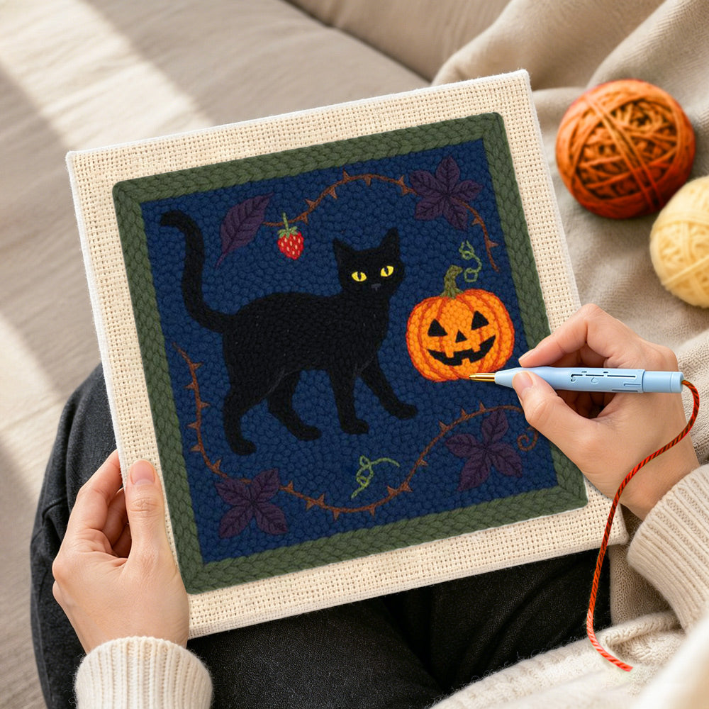Creating handmade black cat pumpkin art punch needle artwork