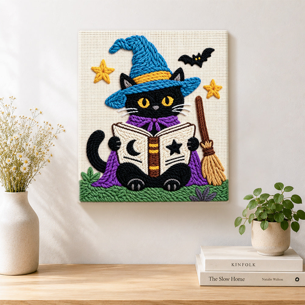 Finished black cat reading magic book artwork displayed on a wall