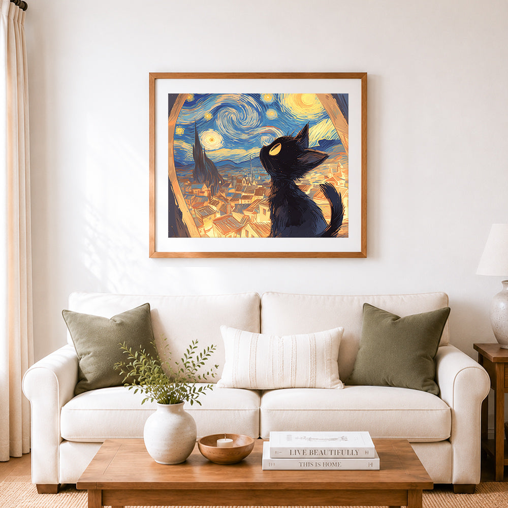Finished black cat silhouette looking at starry night cross stitch artwork displayed as home decor