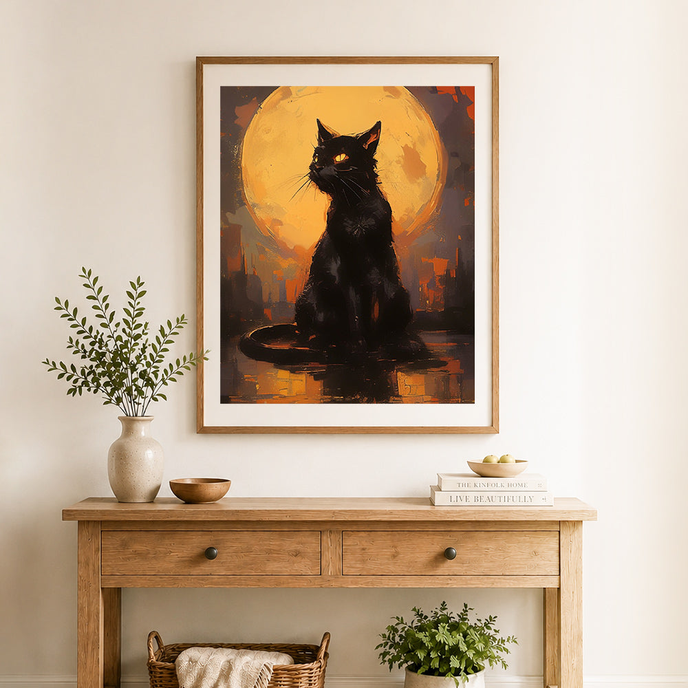 Finished black cat under full moon cross stitch artwork displayed as home decor