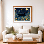 Finished black cat under moonlight cross stitch artwork displayed as home decor