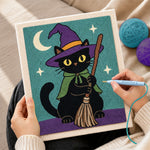 Creating handmade black cat with broom punch needle artwork