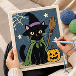 Creating handmade black cat with pumpkin punch needle artwork