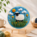 Finished black-faced sheep with giant yellow flowers needle felting displayed on a wooden easel