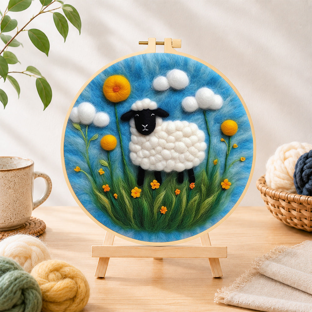 Finished black-faced sheep with giant yellow flowers needle felting displayed on a wooden easel