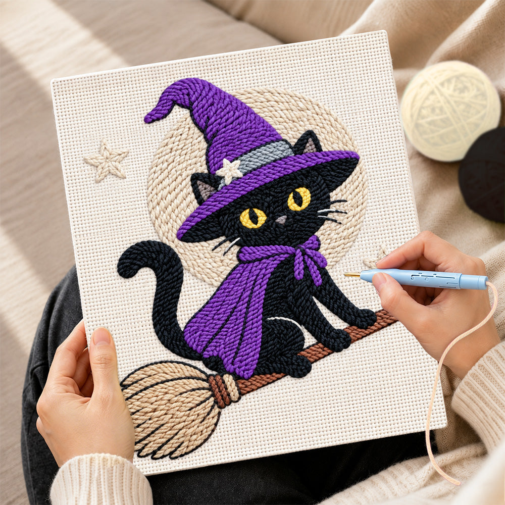 Creating handmade black witch cat on broomstick punch needle artwork