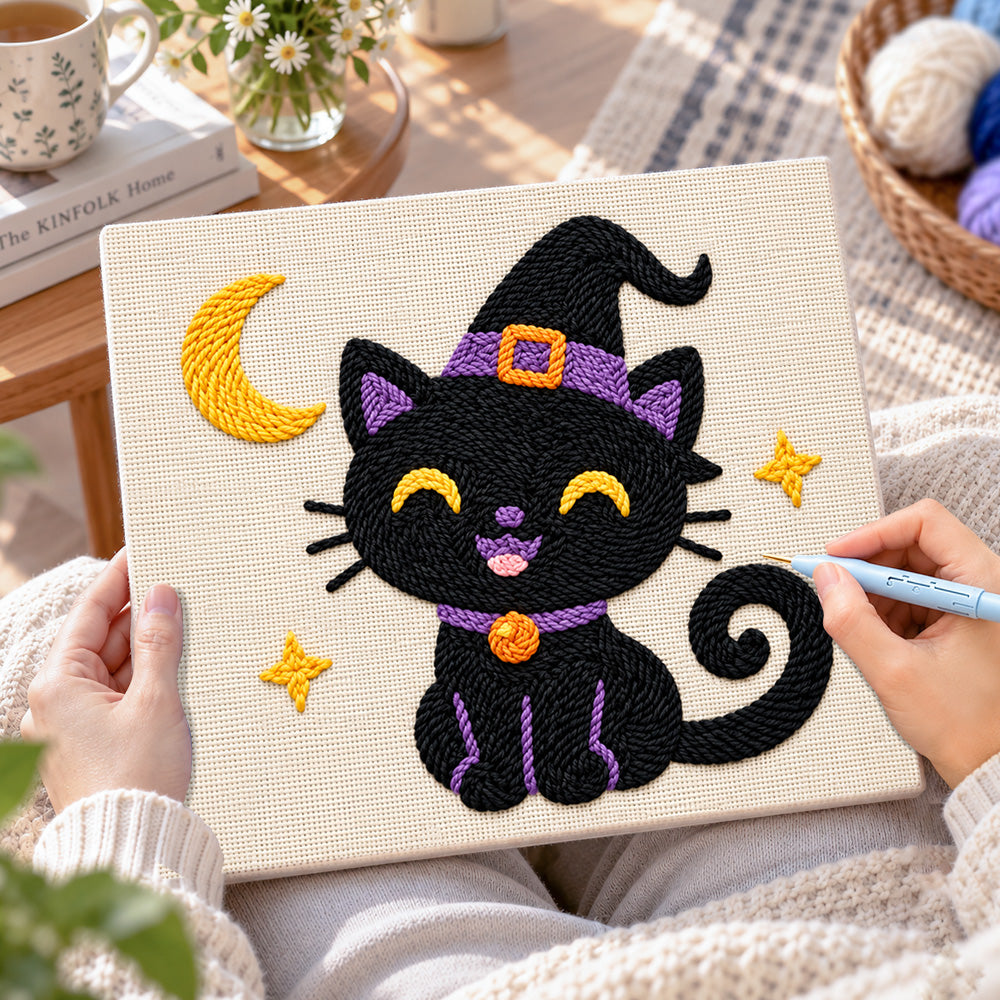 Creating handmade black witch cat with crescent moon punch needle artwork