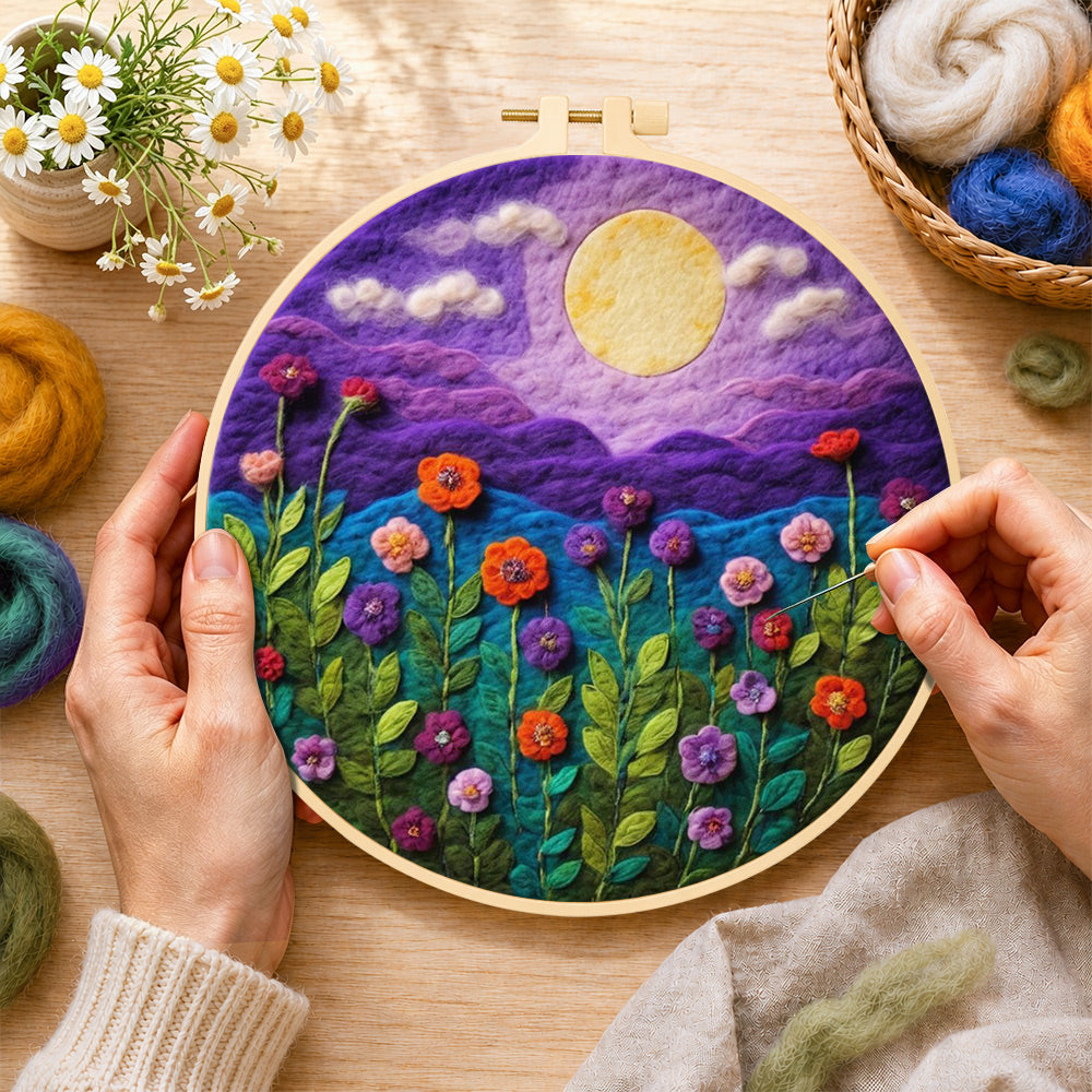 Creating the blooming flowers under the purple night moon wool painting by hand with a felting needle