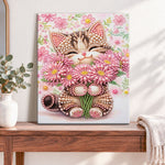 Finished blossom holding kitten pearl diamond painting artwork displayed as home decor