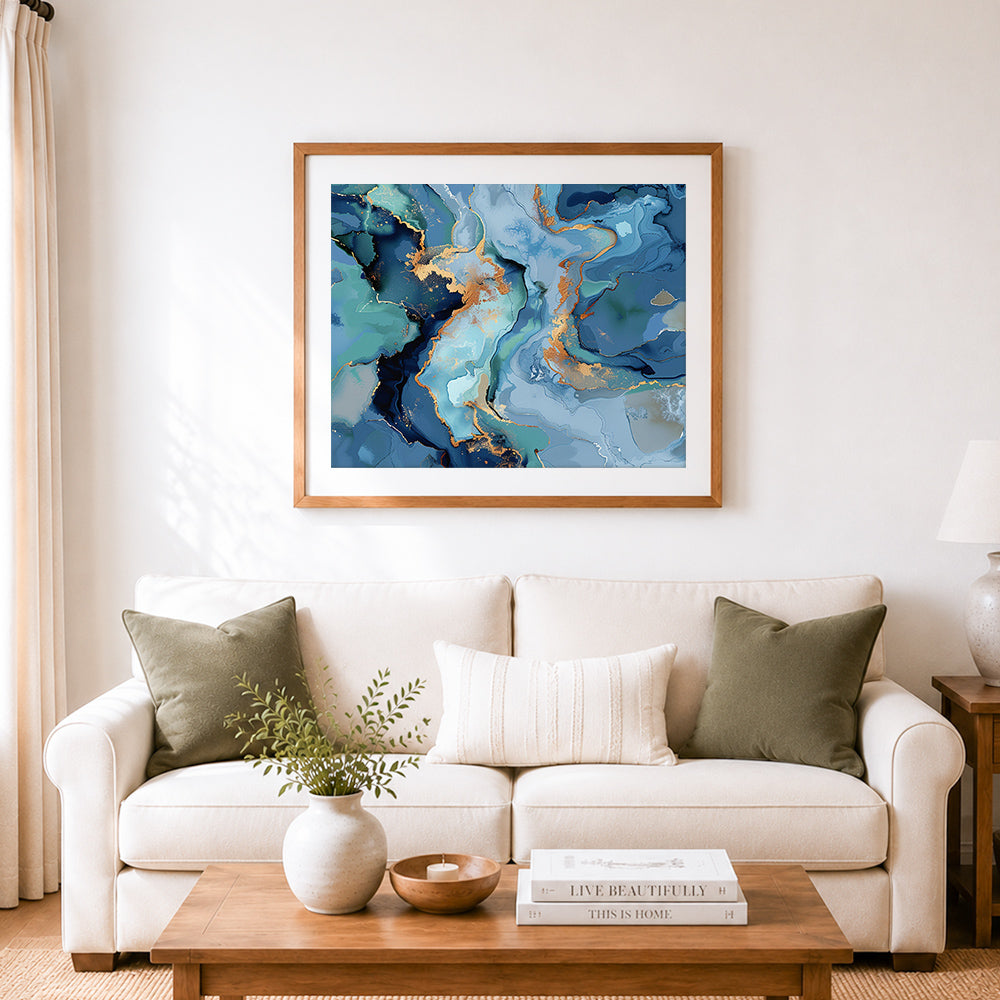 Finished blue and gold abstract fluid art cross stitch artwork displayed as home decor
