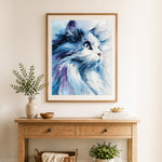 Finished blue brushstroke cat cross stitch artwork displayed as home decor