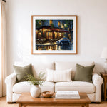Finished blue car at a rainy night bistro cross stitch artwork displayed as home decor