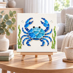 Blue crab sea glass art kit displayed as seasonal home decor