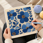 Creating handmade blue florals punch needle artwork