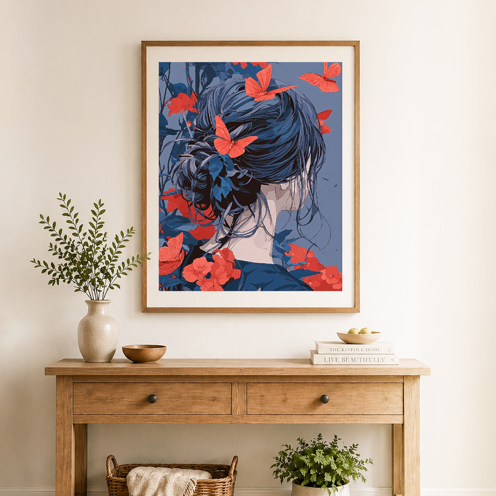 Finished blue hair and red butterflies cross stitch artwork displayed as home decor