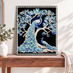 Finished blue peacocks on tree pearl diamond painting artwork displayed as home decor