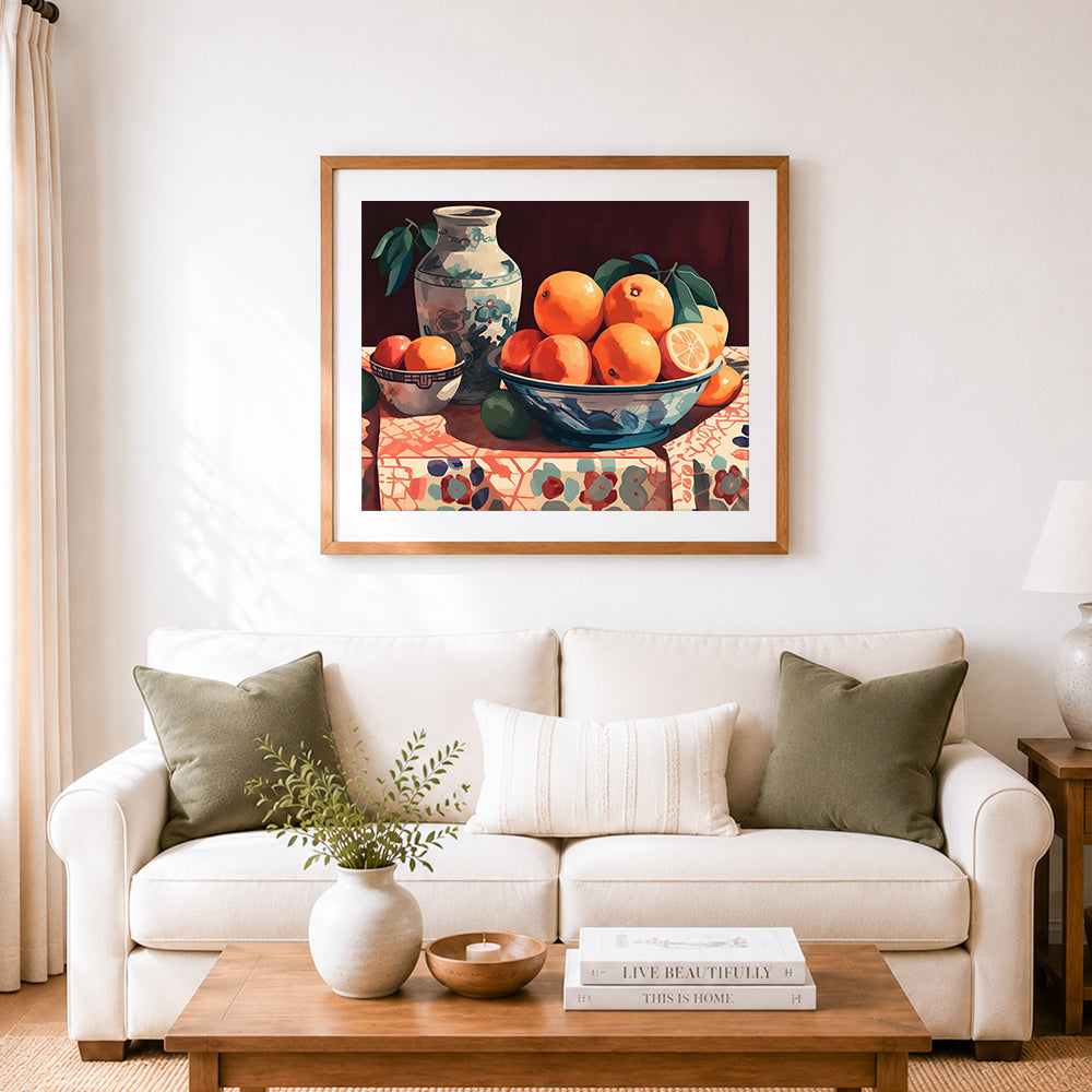 Finished blue porcelain bowl with oranges cross stitch artwork displayed as home decor