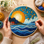Creating the blue waves under the golden sunset wool painting by hand with a felting needle