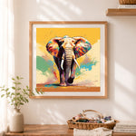 Finished bold elephant with color splashes cross stitch artwork displayed as home decor