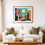 Finished bold geometric cityscape cross stitch artwork displayed as home decor