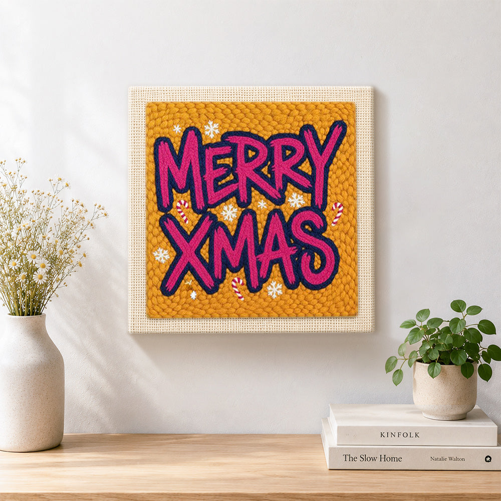 Finished bold merry xmas lettering artwork displayed on a wall
