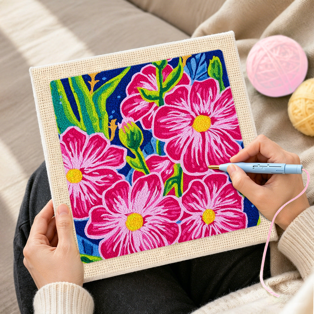 Creating handmade bold pink tropical flowers punch needle artwork