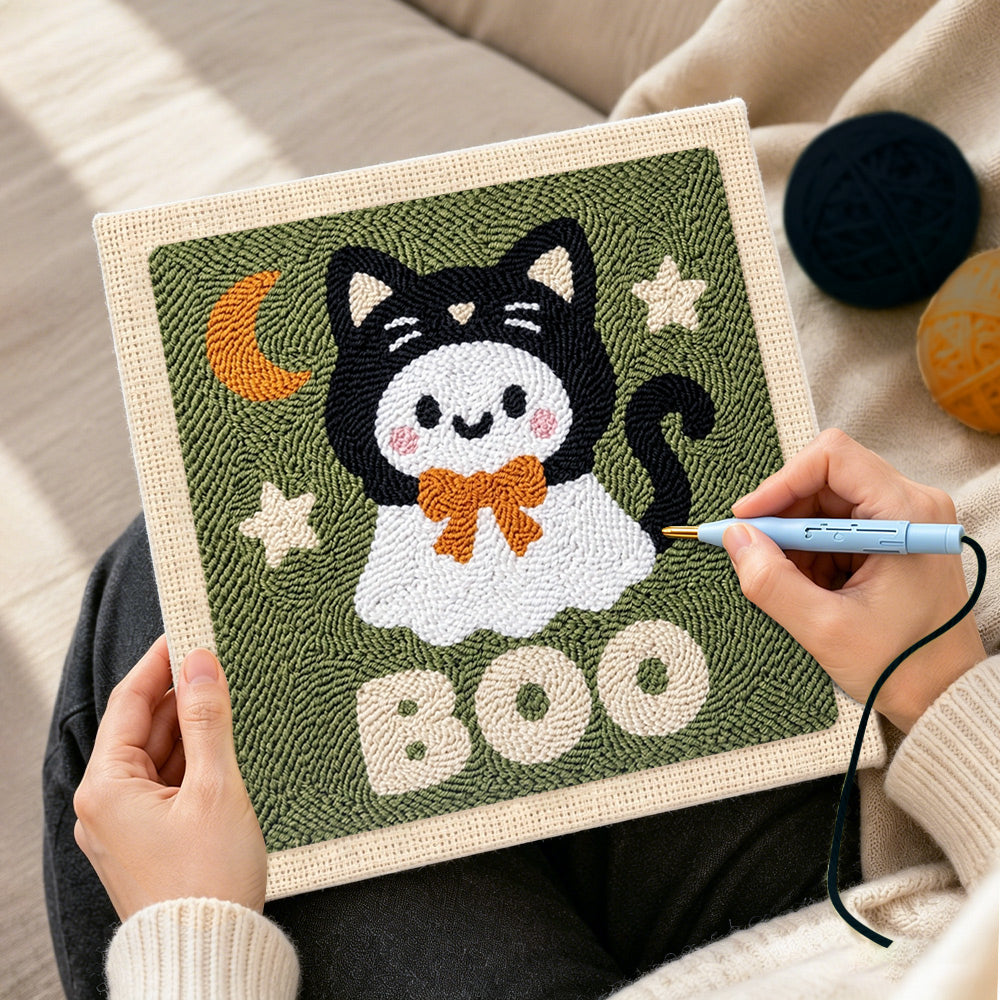 Creating handmade boo ghost cat punch needle artwork