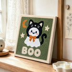 Boo ghost cat punch needle artwork displayed on a table