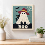 Finished boo ghost with hat artwork displayed on a wall