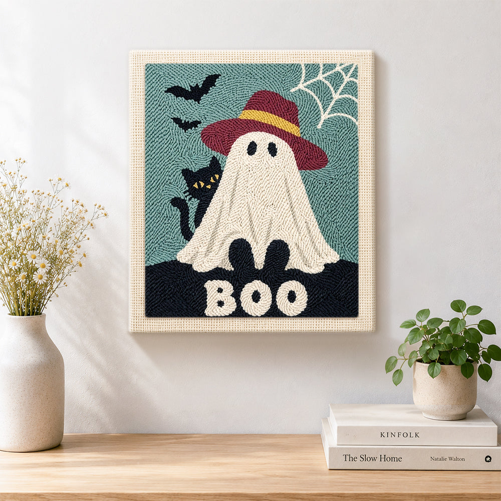 Finished boo ghost with hat artwork displayed on a wall