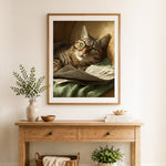 Finished bookish tabby cat cross stitch artwork displayed as home decor