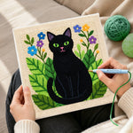 Creating handmade botanical black cat punch needle artwork