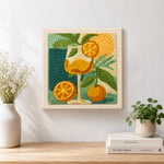 Finished botanical citrus drink artwork displayed on a wall