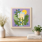 Finished botanical yellow drink artwork displayed on a wall
