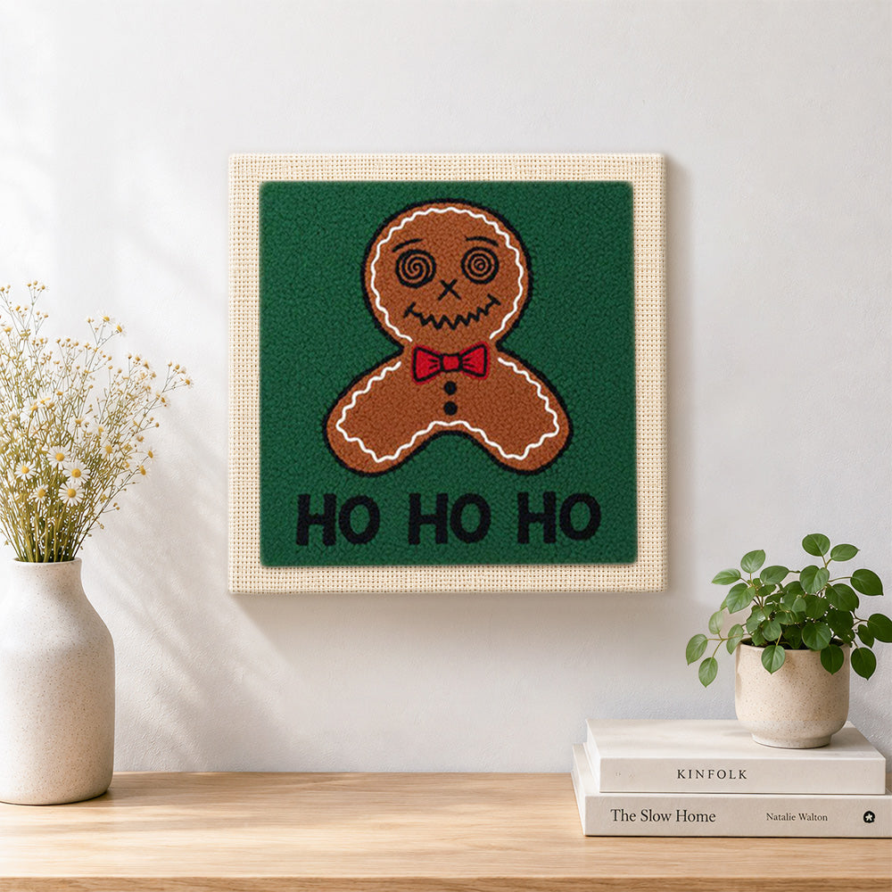 Finished bow tie gingerbread man art artwork displayed on a wall