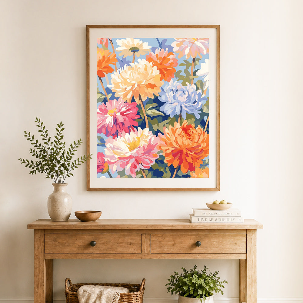 Finished bright dahlia garden cross stitch artwork displayed as home decor