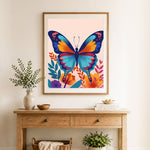 Finished bright floral butterfly cross stitch artwork displayed as home decor