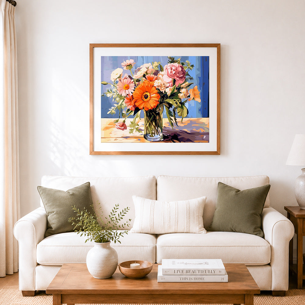 Finished bright gerbera flower bouquet cross stitch artwork displayed as home decor