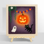 Bright glowing pumpkin punch needle kit for beginners