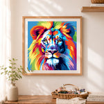 Finished bright pop‑art lion head cross stitch artwork displayed as home decor