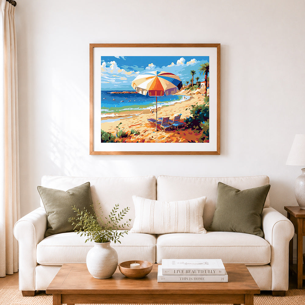 Finished bright sunny coastal beach view cross stitch artwork displayed as home decor