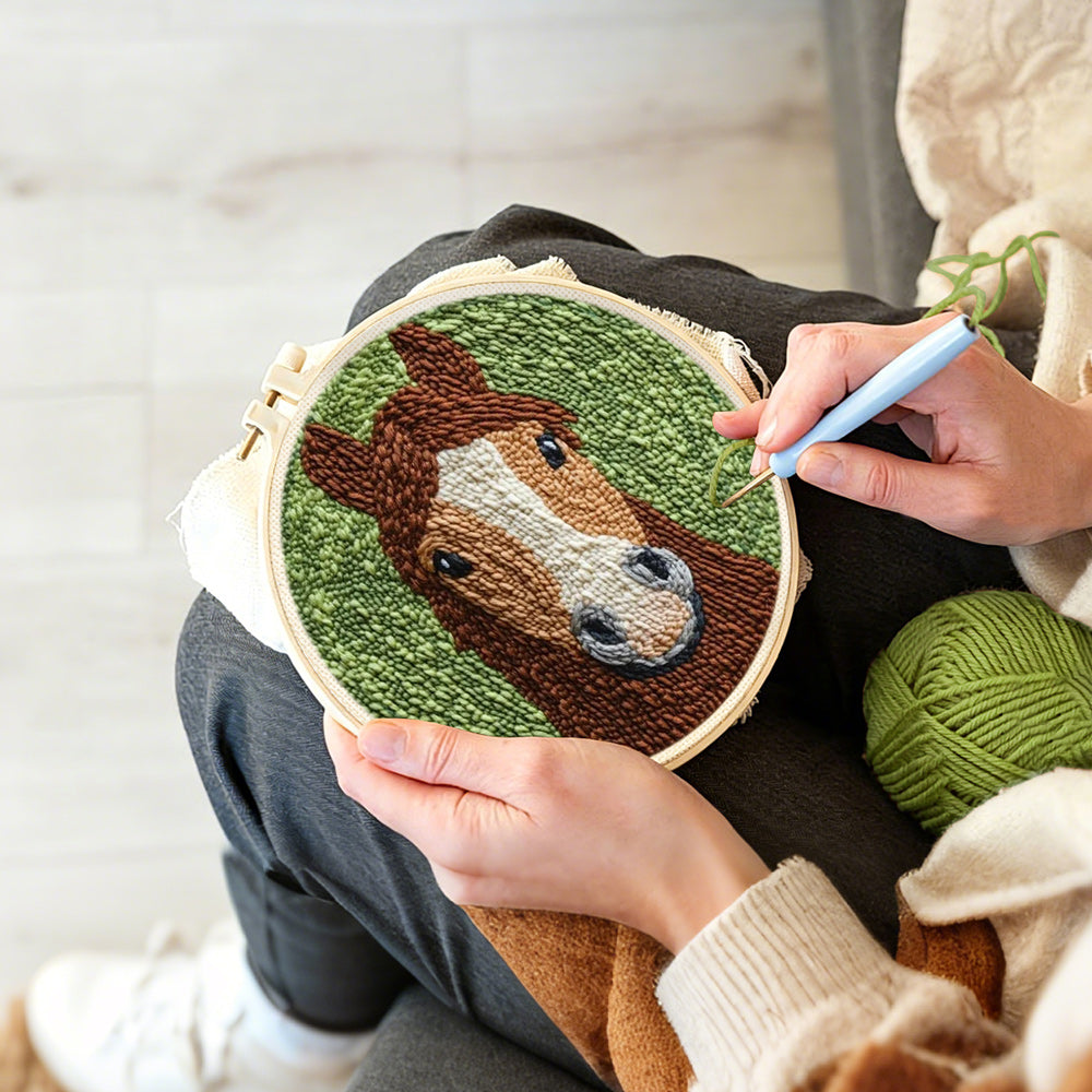 Creating handmade brown horse punch needle artwork