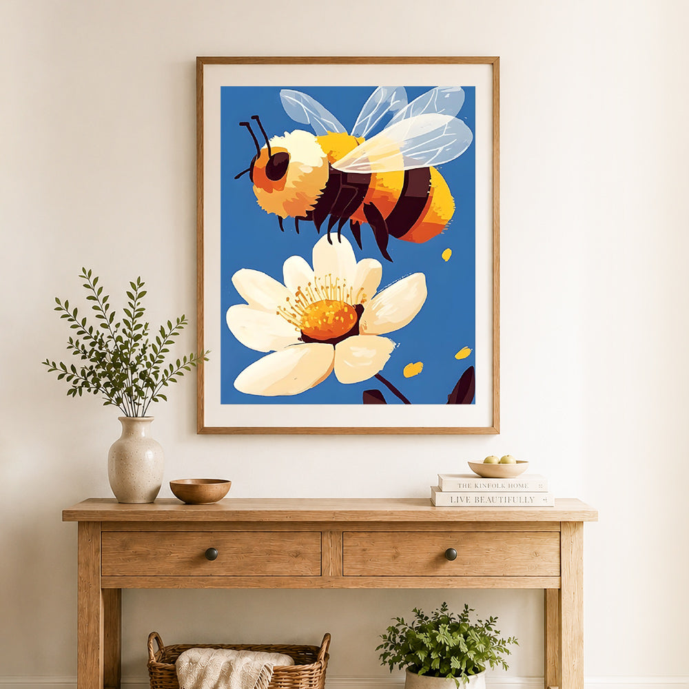 Finished bumblebee and daisy flower cross stitch artwork displayed as home decor